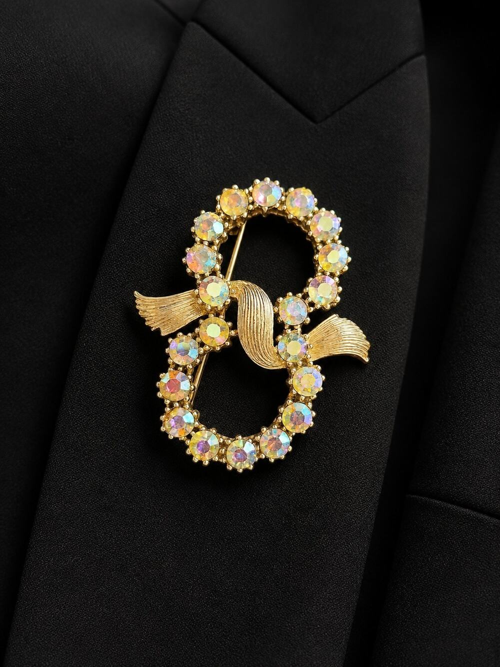 Vintage Coro Aurora Borealis Rhinestone Infinity Ribbon Brooch Gold Tone Pin
